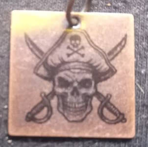 Pirate pendants (antiqued red copper)