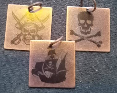Pirate pendants (antiqued red copper)